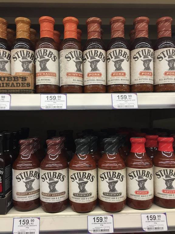 Bottles of Stubbs barbecue sauce on the shelf of a grocery store in the Czech Republic, 2018